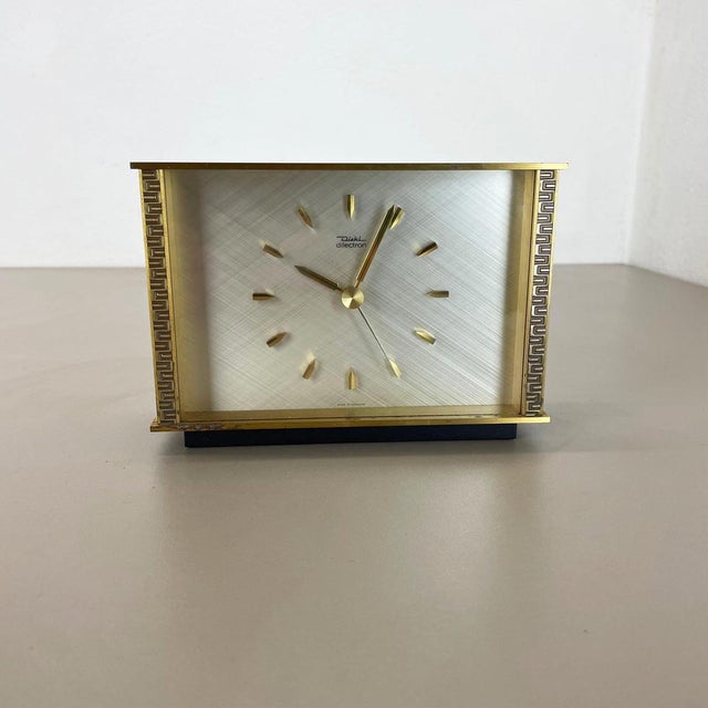 Article: Table Clock. Origin: Germany. Producer: DIEHL, Germany. Age: 1960s. This original wooden table clock was produced...