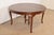 An exceptional antique Victorian or Queen Anne quarter sawn oak extension dining table In the manner of R.J. Horner & Co....