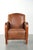 Beautiful Art Deco style sheepskin armchair with wooden armrests, excellent seating comfort, and a characterful...