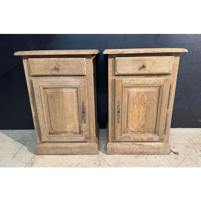 A very good quality pair oak bedside cupboards or cabinets dating to the mid 20th Century. Originating from France and...