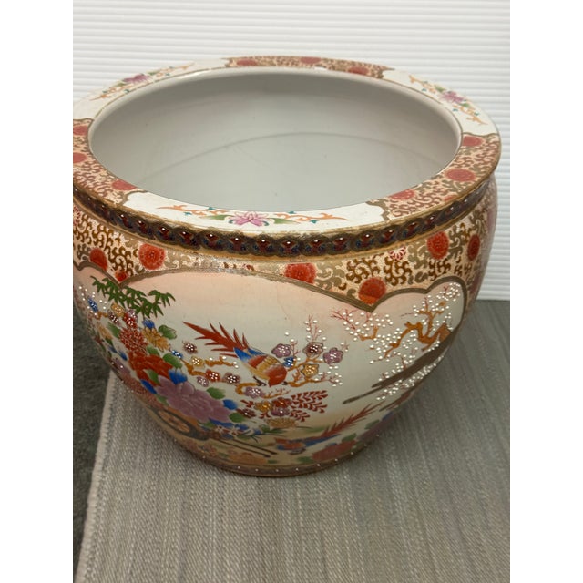 Design Plus Gallery presents a Vintage Satsuma-Style Porcelain Jardiniere. This large, rounded vessel displays an...