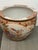 Design Plus Gallery presents a Vintage Satsuma-Style Porcelain Jardiniere. This large, rounded vessel displays an...