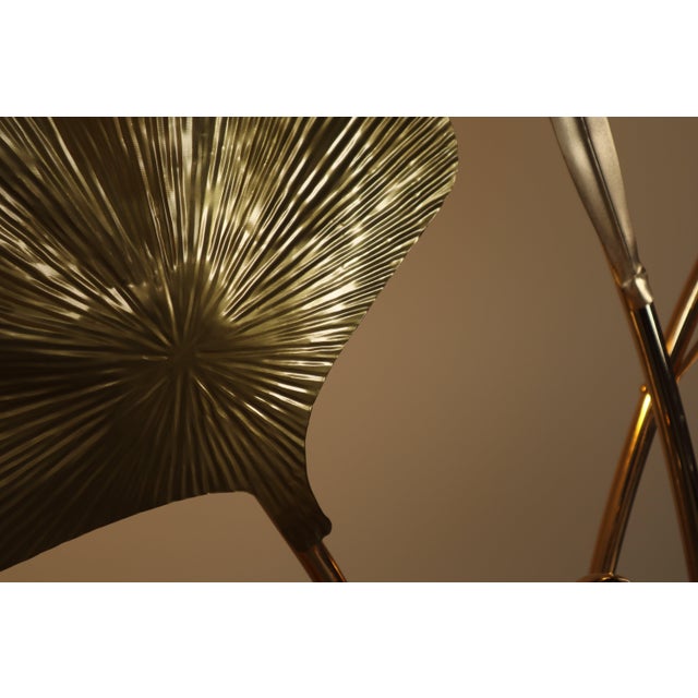 This impressive sculptural floor lamp is an Italian design from the 1970s, featuring a stylised brass flamingo standing in...