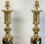 Pair of monumental 'Ace of Diamonds' brass candlestick lamps Each one of the 'Ace of Diamonds' pattern, the candlestick...