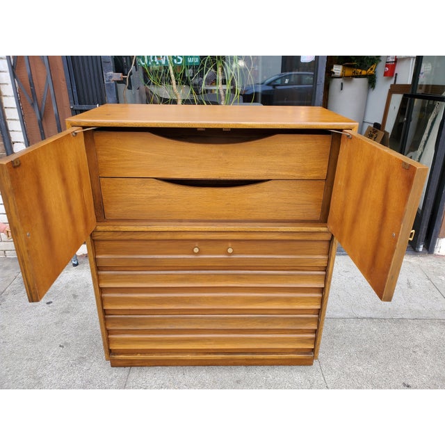 Vintage American of Martinsville tall dresser. The wood appears to be bleached walnut. The dresser is in excellent...