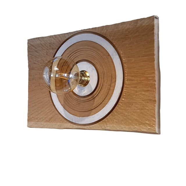 "Goccia" lamp by Pietro Meccani, 1996. Wall lamp made of carved oak wood painted in shades of white. Handmade. Dimensions...