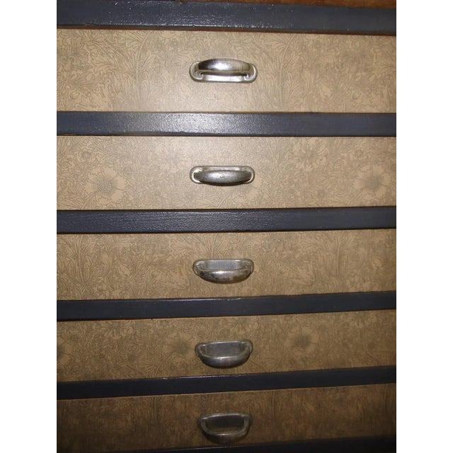 Antique tool cabinet that has had a hard life in the service of a jeweler, pharmacy, electronics workshop and most...