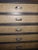 Antique tool cabinet that has had a hard life in the service of a jeweler, pharmacy, electronics workshop and most...