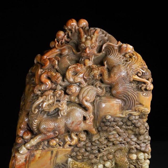 An extraordinary, museum-quality centerpiece: A monumental Shoushan stone carving depicting a celestial mountain scene...