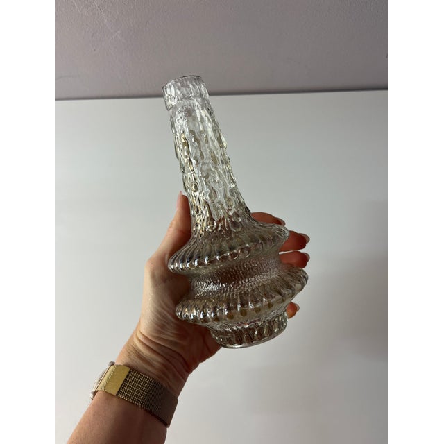 This small frosted glass vase was designed by Finnish designer Timo Sarpaneva for Iittala and produced in the 1970s. The...