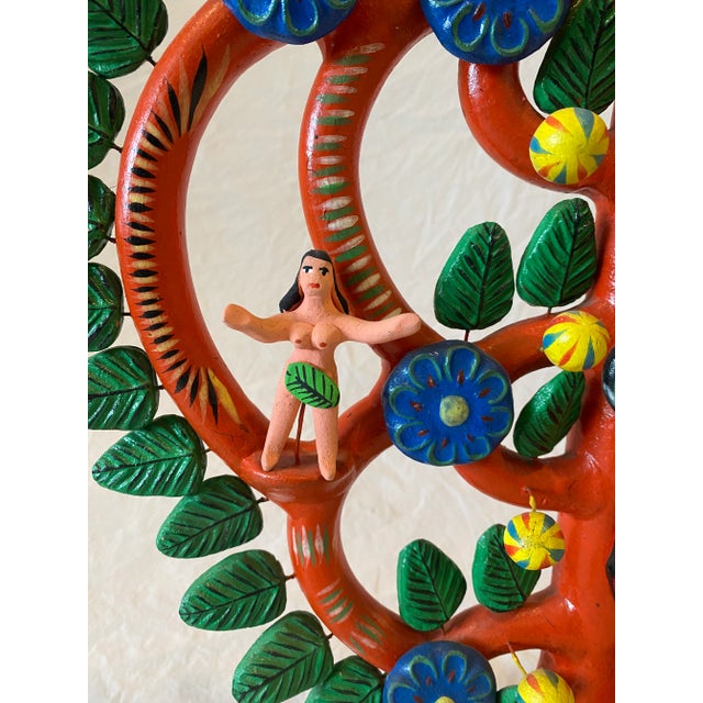 Ortega's "Fine Tree of Life Adam & Eve Candelabra," crafted in Mexico during the 2000s, is a vivid piece of folk art made...