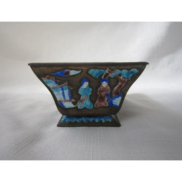 Pre-revolutionary Chinese Planter - Cache Pot. Enameled scenes on all sides and stamped "China" on the base. It measures...