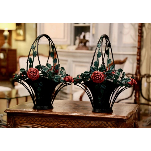 For inside or outside use, these elegant antique baskets were crafted in France circa 1950, made of heavy metal, the large...
