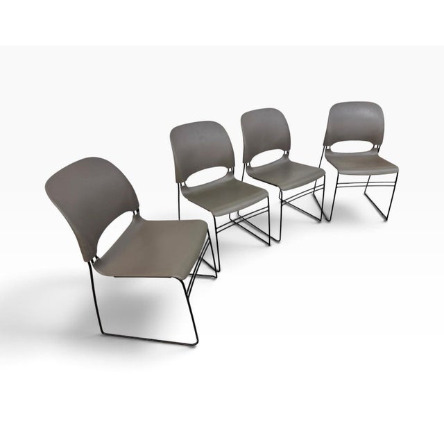 Add authentic Herman Miller design to your workspace with this set of four Limerick stacking office chairs, circa 2009....
