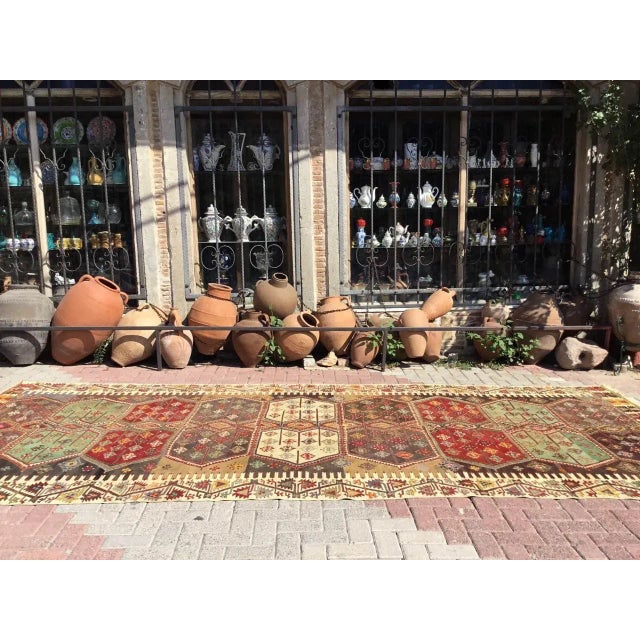 This beautiful, vintage, handwoven kilim is approximately 60 years old. It is handmade, of very fine quality hand spun...