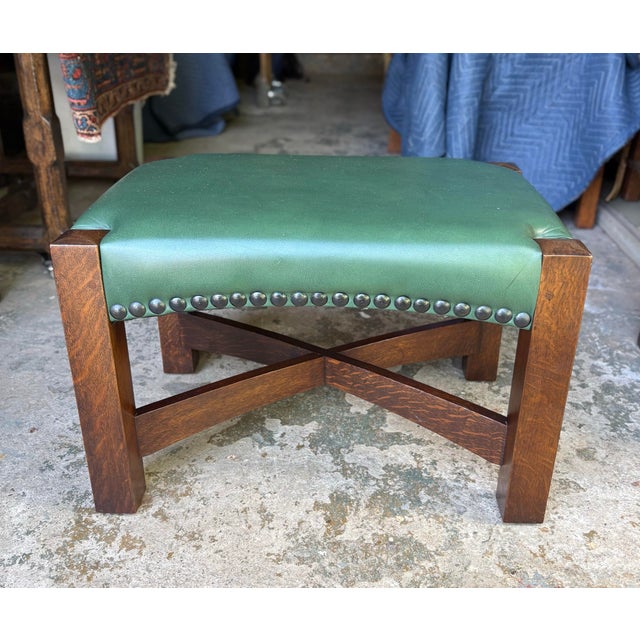 Great piece of Stickley with quarter sawn oak and green leather.