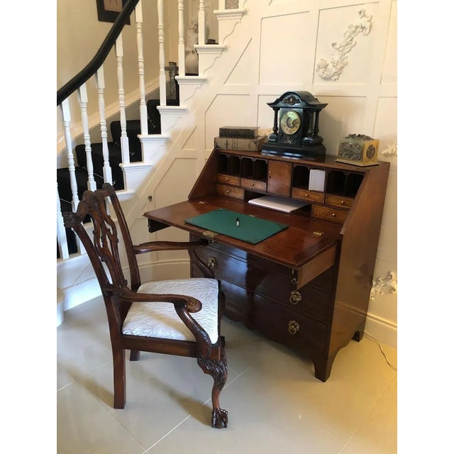 Antique george iii quality mahogany bureau having a mahogany fall opening to reveal a fully fitted interior consisting of...