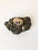 A whimsical mid century pebble sculpture of 2 small pebble owls attached to a rock base. The base has been given a slight...