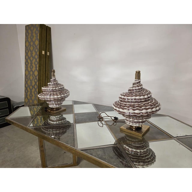 Pair of large shell lamps by Giulia Mangani Refined and elegant ceramic lamps. The ceramist has masterfully reproduced two...