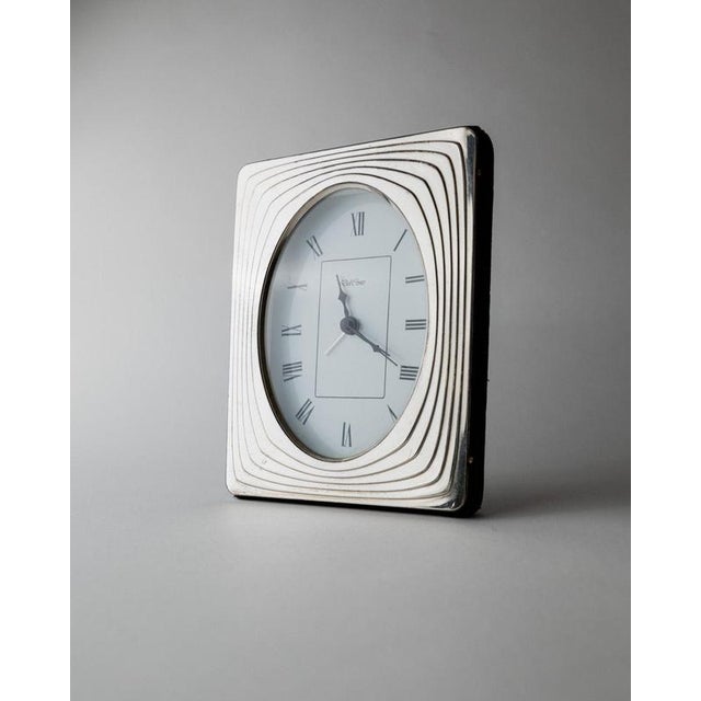 This vintage desk clock from the 1960s by Del Conte Italy is an elegant example of refined Mid Century design. The silver...