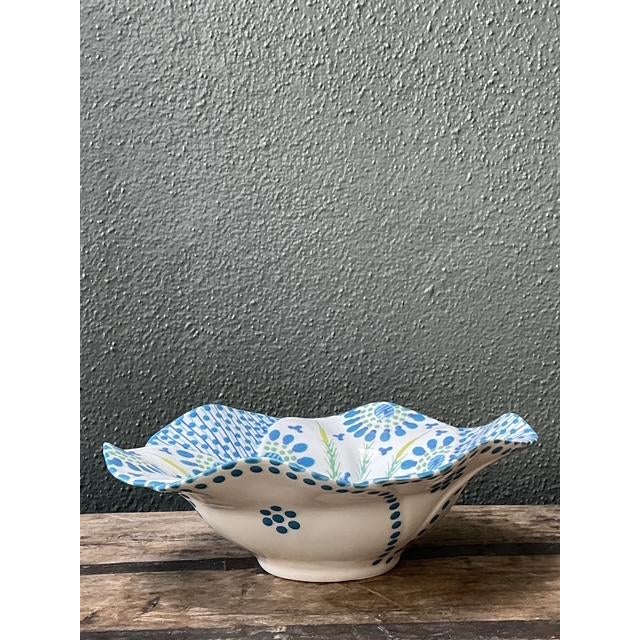 This charming vintage ceramic bowl from Devonshire Home & Garden is a masterful display of whimsical botanical design....