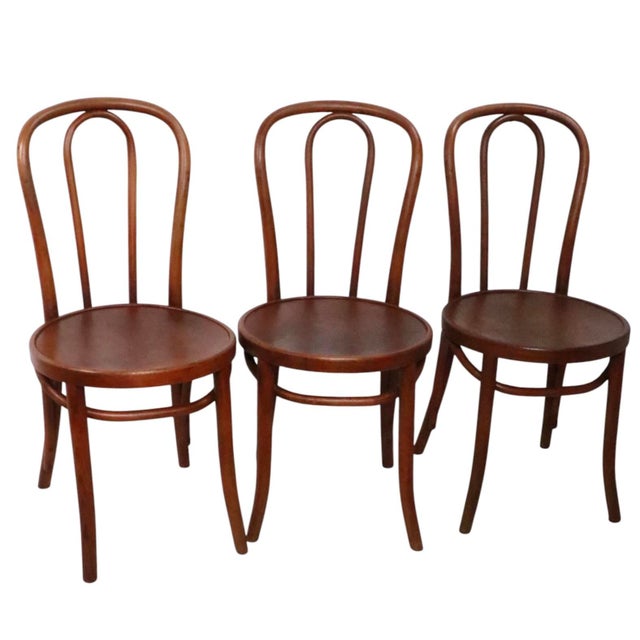 Assembled set of four ( 3 + 1 ) Vienna Secessionist style cafe, bistro, dining chairs. Offered as a set of four, three are...