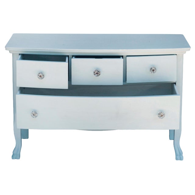 Victorian serpentine dresser featuring a distinct curved profile on Cabriolet legs with distinctive claw feet. Custom...