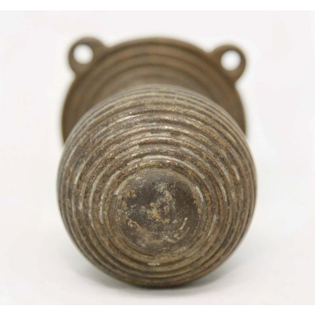 Vintage dummy door knob made of bronze with a ball shape and concentric design. The original mounting screws are not...
