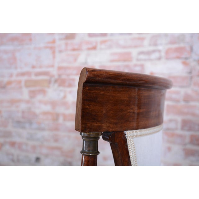 This rare and aesthetically refined pair of chairs in the spirit of French Art Deco dates from the 1920s in France. The...