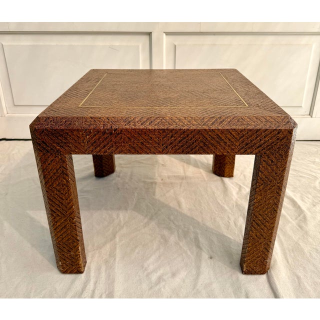 This stunning woven reed side table, attributed to Harrison Van Horn, features a beautifully executed parquet-style...