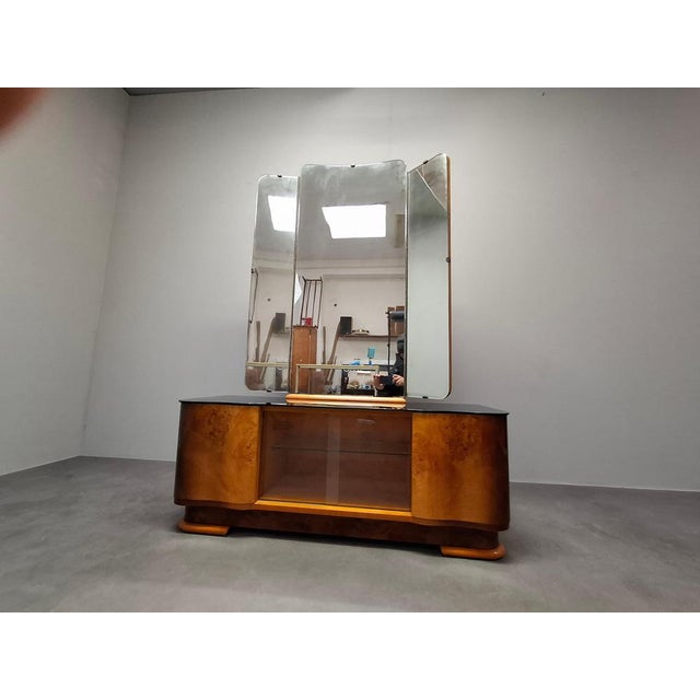 An outstanding Art Deco vanity cabinet attributed to Jindřich Halabala, designed in Czechoslovakia during the 1930s. This...