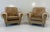 Elegant and highly distinctive pair of Italian armchairs dating from the 1950s, distinguished by their generous...