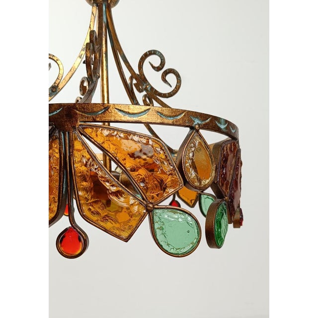 S chandelier that showcases the extraordinary craftsmanship of Italian artisans. Made in Italy around the 70s by the...