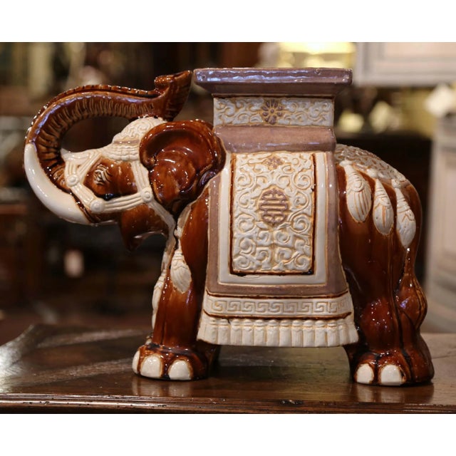 Bring a sculptural and whimsical accent to a room or patio with this vintage French faience elephant garden seat, crafted...