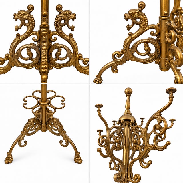 An impressive antique freestanding brass hall tree / coat and hat rack, featuring elaborate scrolling metalwork and an...