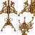An impressive antique freestanding brass hall tree / coat and hat rack, featuring elaborate scrolling metalwork and an...