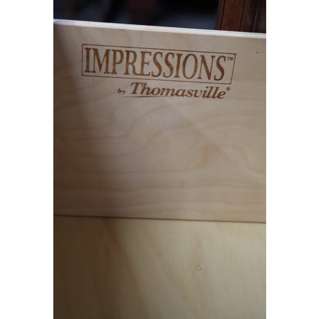 Thomasville Impressions gentleman’s chest in a Louis Philippe style with a warm cherry finish, clean molded edges, and...