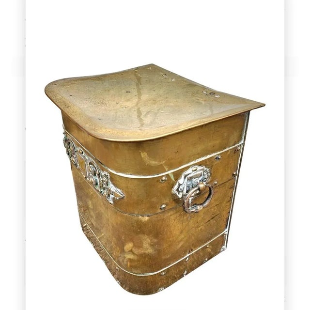 An Early 20th Century Art Deco Brass Fireplace hinged covered top Fuel Bucket with iron double lined. Measures 15" in...