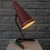 A distinctive swedish table lamp manufactured by gnosjö konstsmide in the 1950s, combining sculptural form with the...