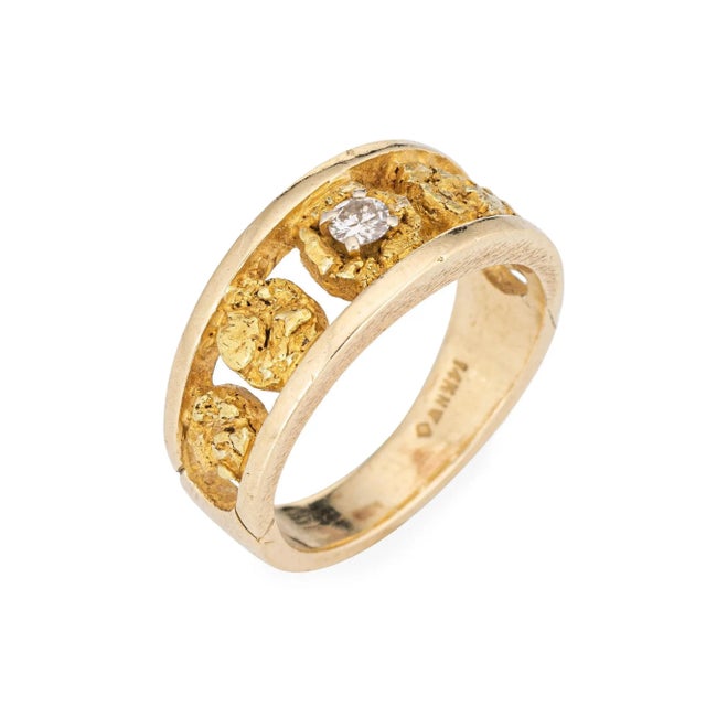 Stylish vintage nugget & diamond ring (circa 1970s) crafted in 14 karat yellow gold (the gold nuggets are 24k gold). One...