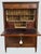Elegant French Louis XVI style secretary desk featuring beautiful bookmatched veneer on the fall-front writing surface and...
