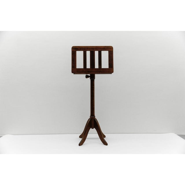 Height adjustable from 117-151cm. The shelf is 50cm x 33cm.