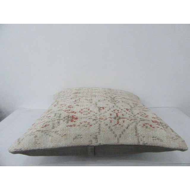 Decorative pillow cover made from a vintage Turkish handknotted rug. Backed with good quality cotton fabric. Pillow...