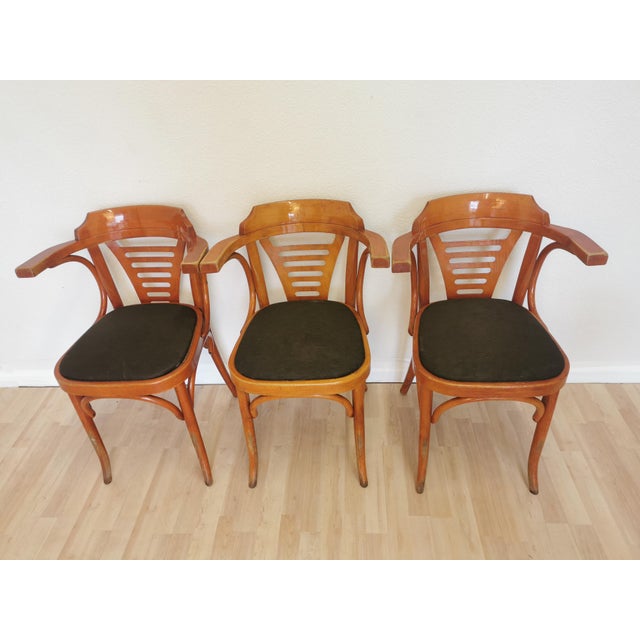 These 3 bentwood chairs are around 45 years old. They were made back in Yugoslavia in the 1980s. The manufacturing...