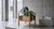 Solid oak planter stand attributed to Danish designer Henning Kjærnulf, produced in Denmark during the 1960s. The piece...