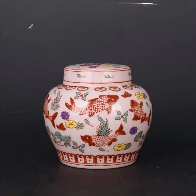 H-13cm,W-14cm This China old porcelain factory made Famille Verte porcelain tea jar is a vintage piece featuring multi-...