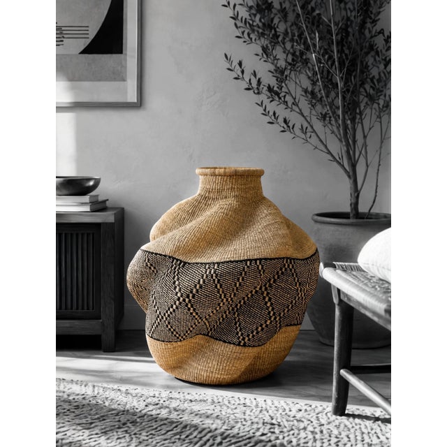 Bloom I explores the relationship between organic form and structural discipline. Woven entirely from sustainably...