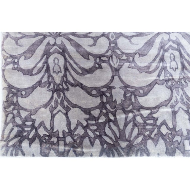 This modern traditional-inspired wool rug blends timeless artistry with a contemporary sensibility, drawing on classical...