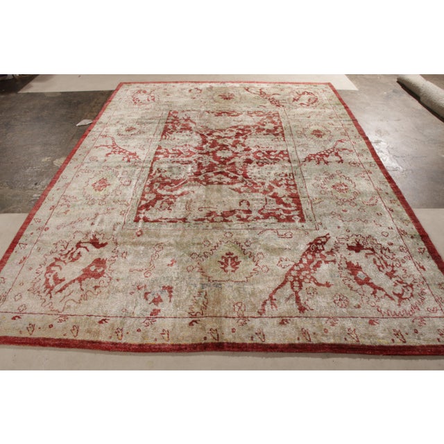 Originating from India, this new Agra silk rug depicts an uncommon modern homage to lesser-known Indian symbolism. Hand...