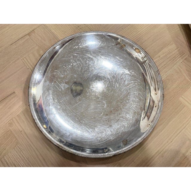 Large vintage silver plate serving tray. Perfect for display or use. Does show some noticeable wear and tarnish- I have...